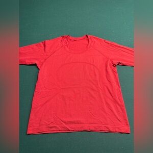 Lululemon “Swiftly Tech Long-Sleeve Shirt 2.0
Waist Length” Red Shirt